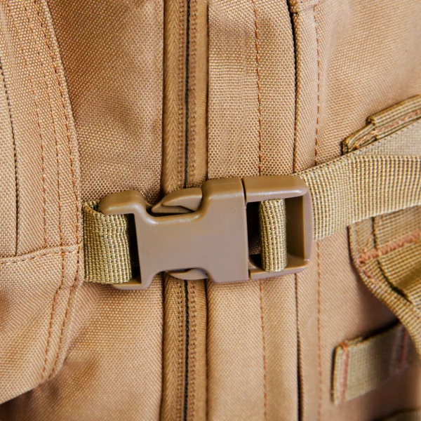 A close up of the buckle on a backpack